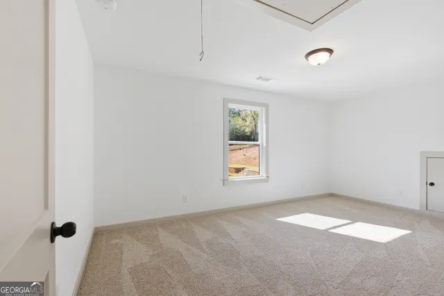 an empty room with windows