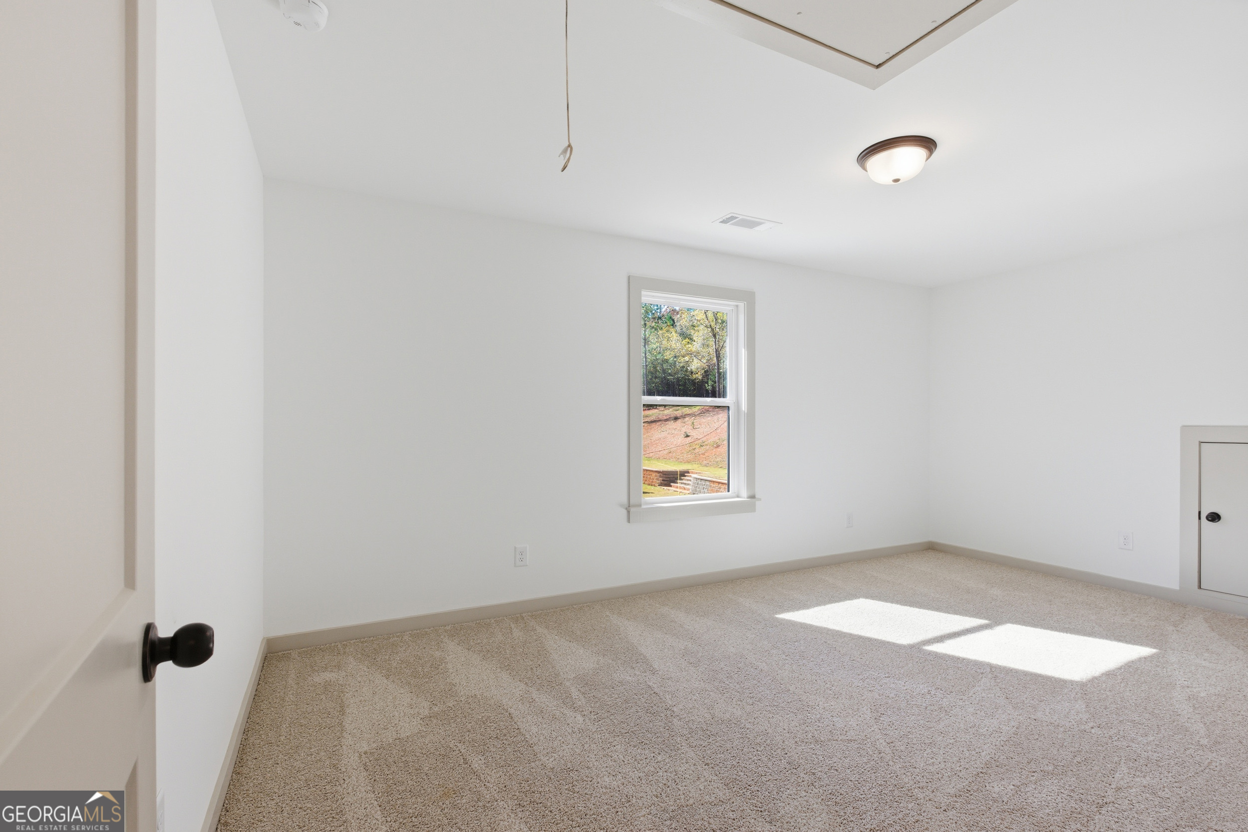 297 Ayers Creek Drive Toccoa, GA 30577 - Photo 39 of 51 an empty room with windows