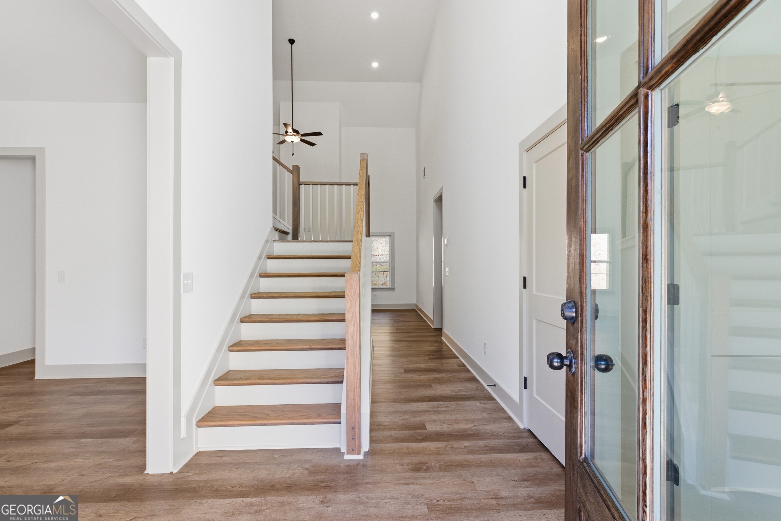 297 Ayers Creek Drive Toccoa, GA 30577 - Photo 6 of 51 a view of a hallway with wooden floor and entryway