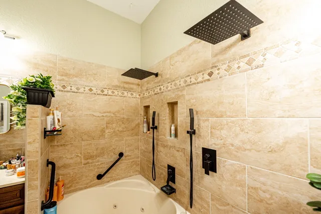 a dining room with furniture and wooden floor