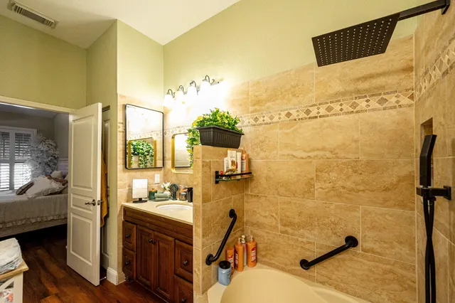a view of a livingroom with furniture and a window