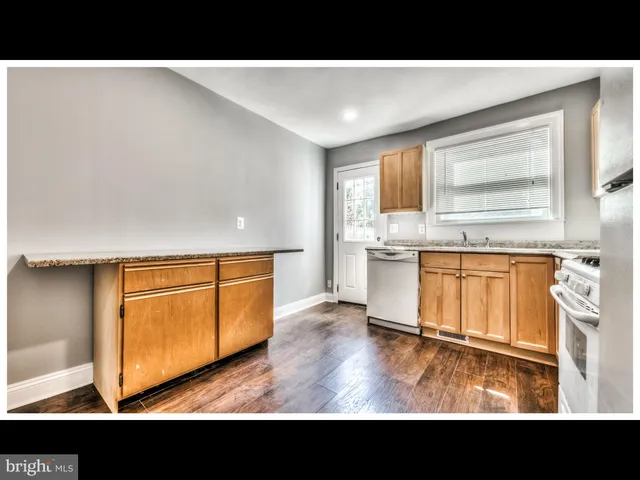 a view of a living room and bathroom