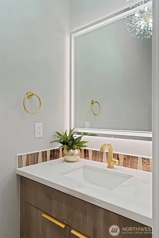 a view of a dining room with furniture and window