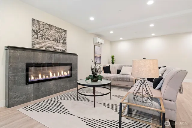a bathroom with a sink toilet a mirror and shower