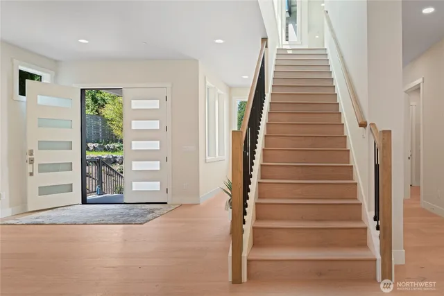 a view of an entryway with stairs