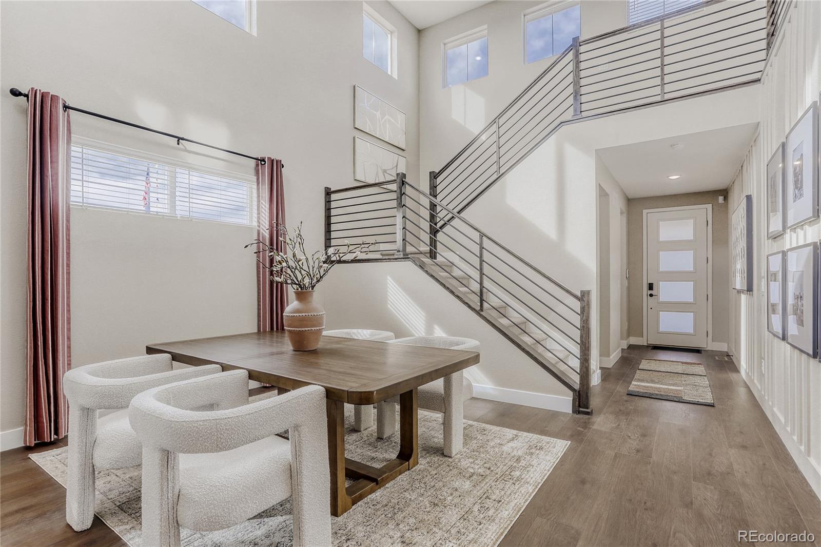5386 Starling Way Firestone, CO 80504 - Photo 9 of 28 a view of a livingroom with furniture and entryway