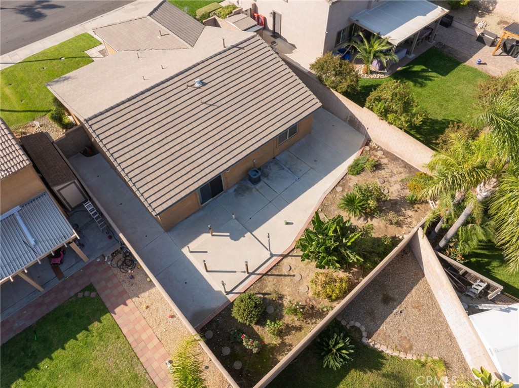 6361 Pintail Way Fontana, CA 92336 - Photo 27 of 32 a view of a balcony with wooden floor and fence next to a yard