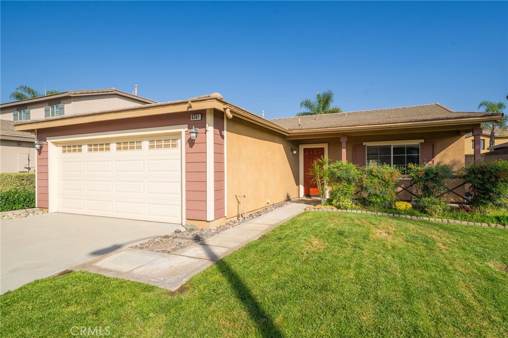 6361 Pintail Way Fontana, CA 92336 - Photo 3 of 32 a front view of house with yard