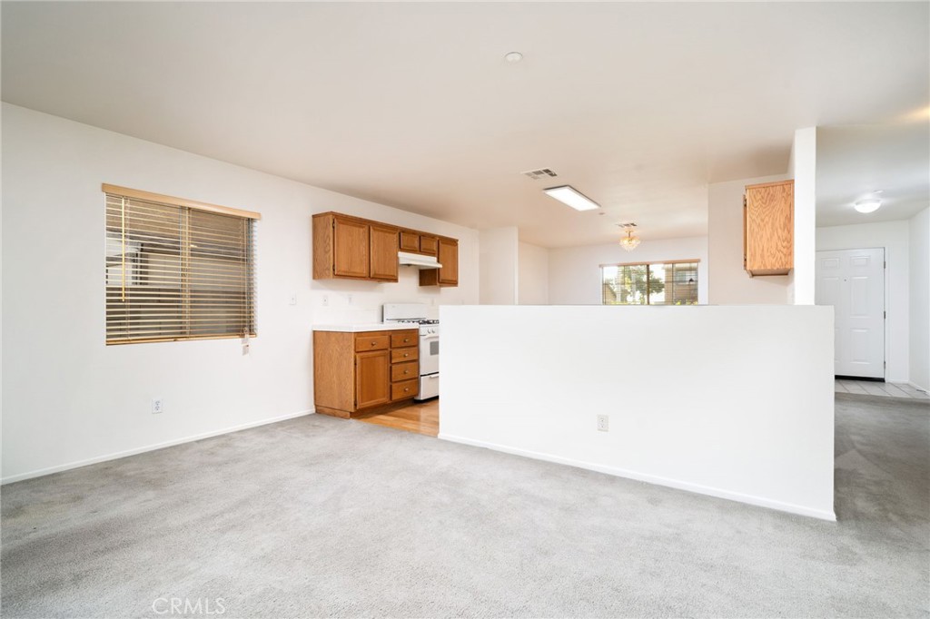 6361 Pintail Way Fontana, CA 92336 - Photo 7 of 32 a view of an empty room with a window
