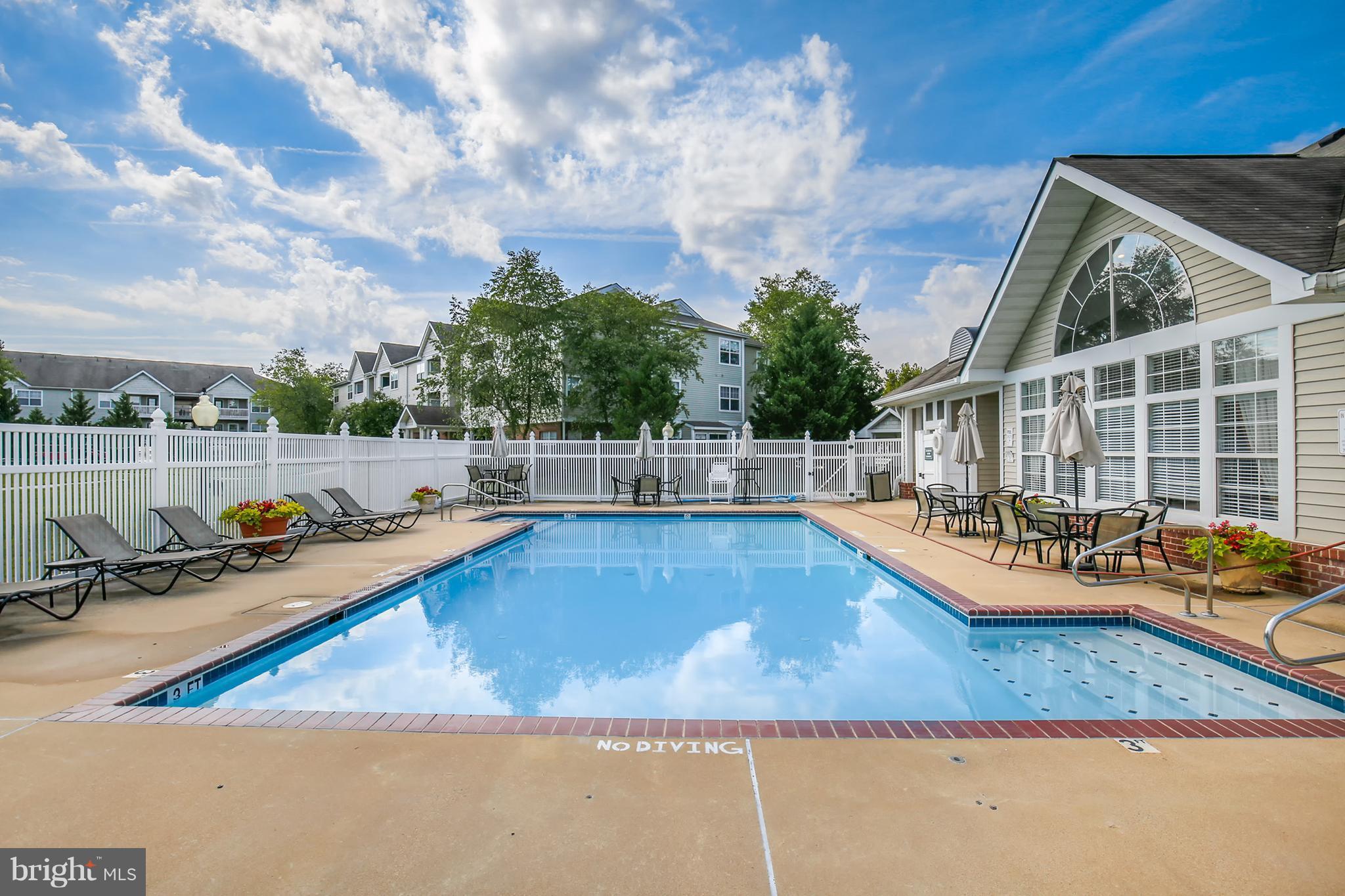 25272 Riffleford Square, Unit 304 Chantilly, VA 20152 - Photo 29 of 30 swimming pool view with a outdoor seating
