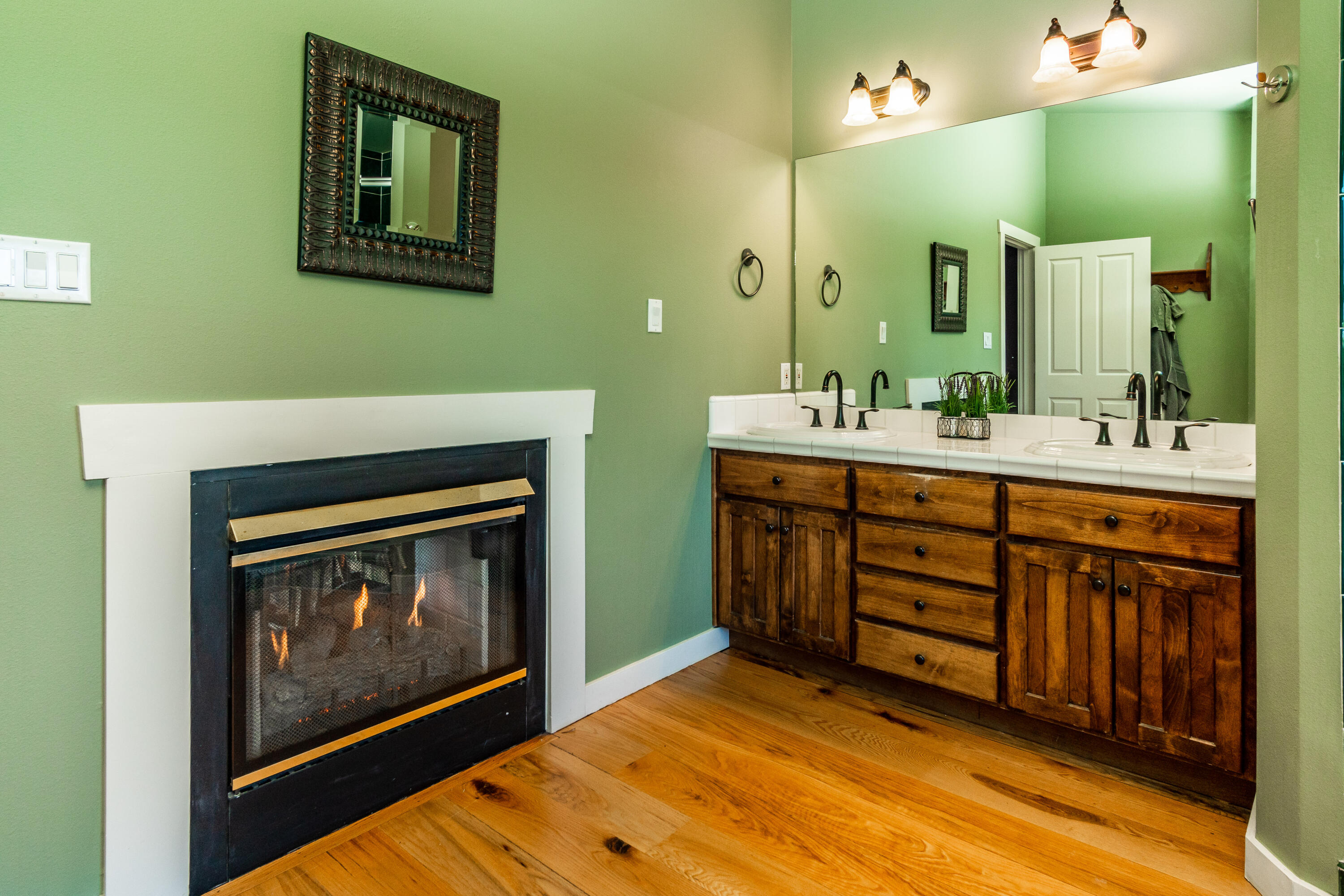 22234 Nelson Road Bend, OR 97701 - Photo 41 of 60 a bathroom with a sink and a mirror