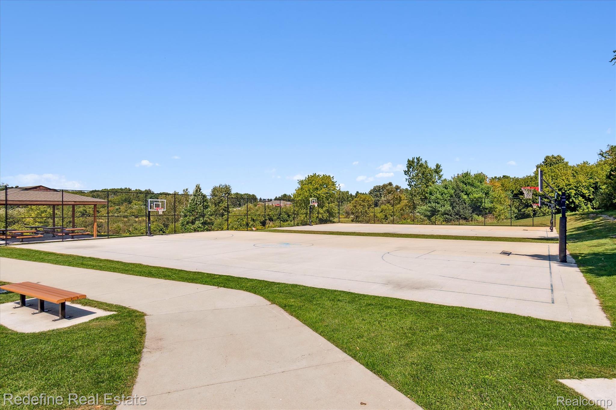 3777 Dorr Road Brighton, MI 48116 - Photo 77 of 77 View of community with community basketball court, a gazebo, and a patio area
