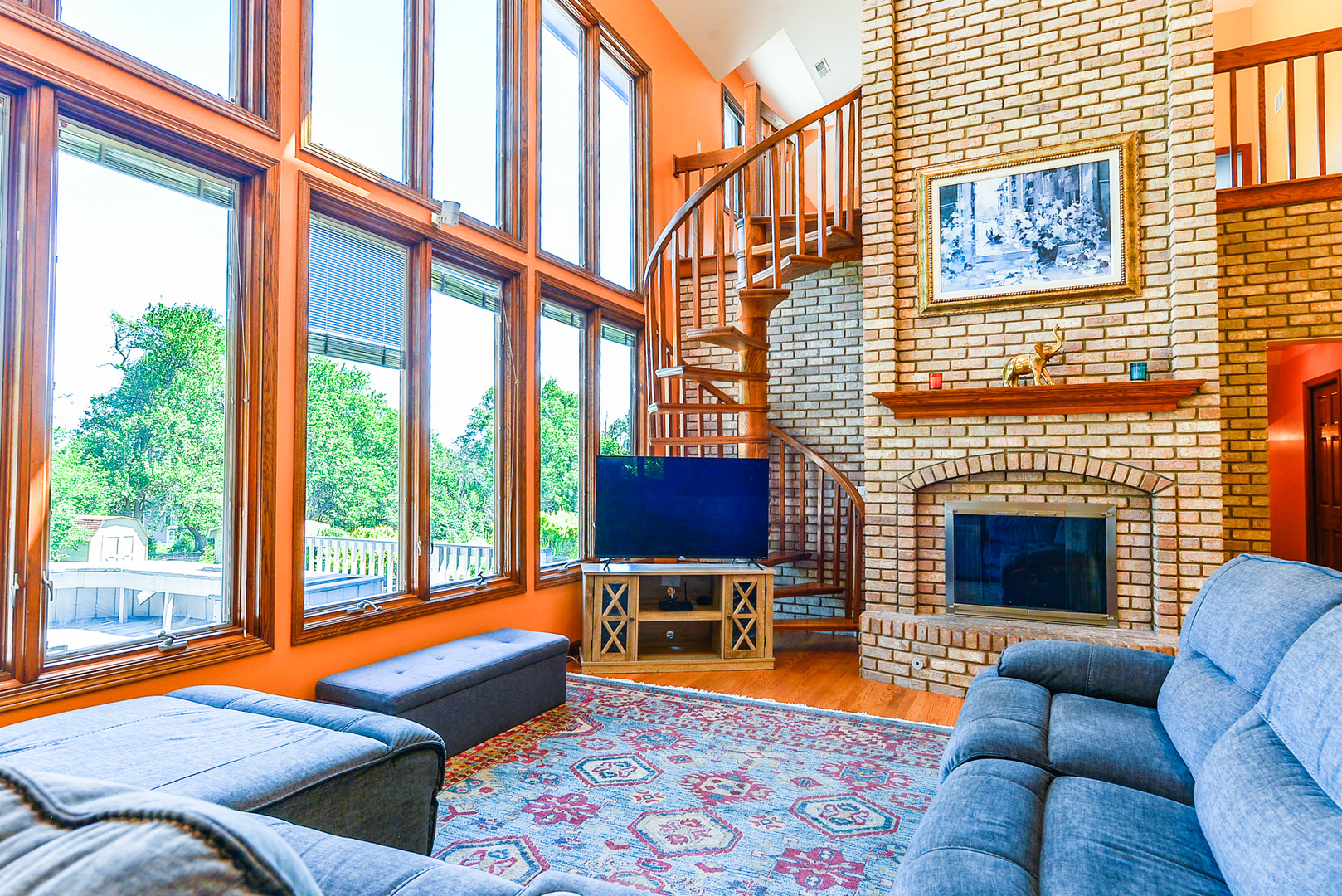 624 Riedy Road Lisle, IL 60532 - Photo 12 of 68 a living room with furniture and a fireplace