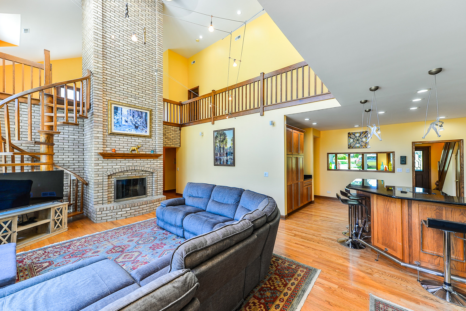 624 Riedy Road Lisle, IL 60532 - Photo 14 of 68 a living room with fireplace furniture and a flat screen tv