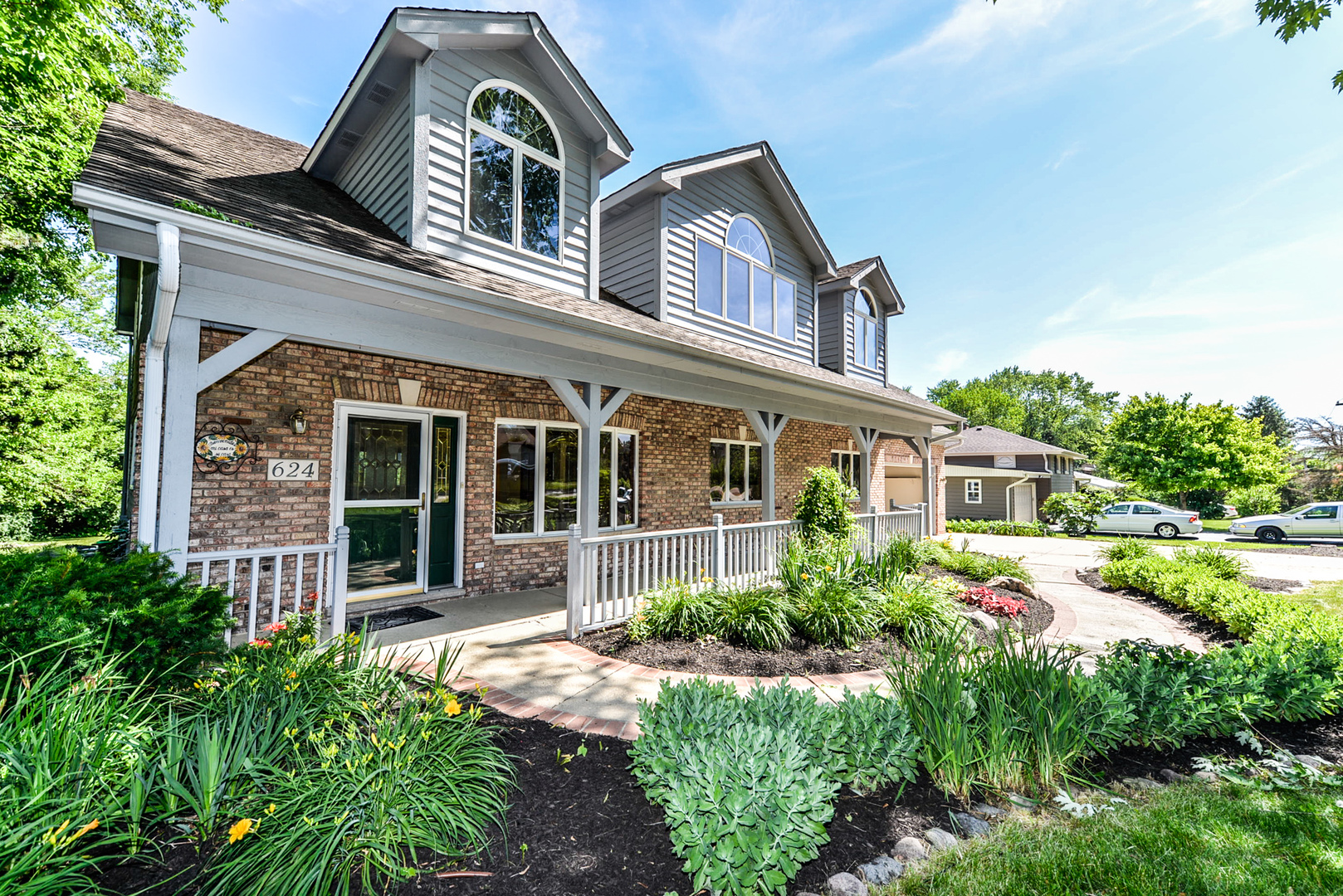 624 Riedy Road Lisle, IL 60532 - Photo 2 of 68 front view of house with a yard