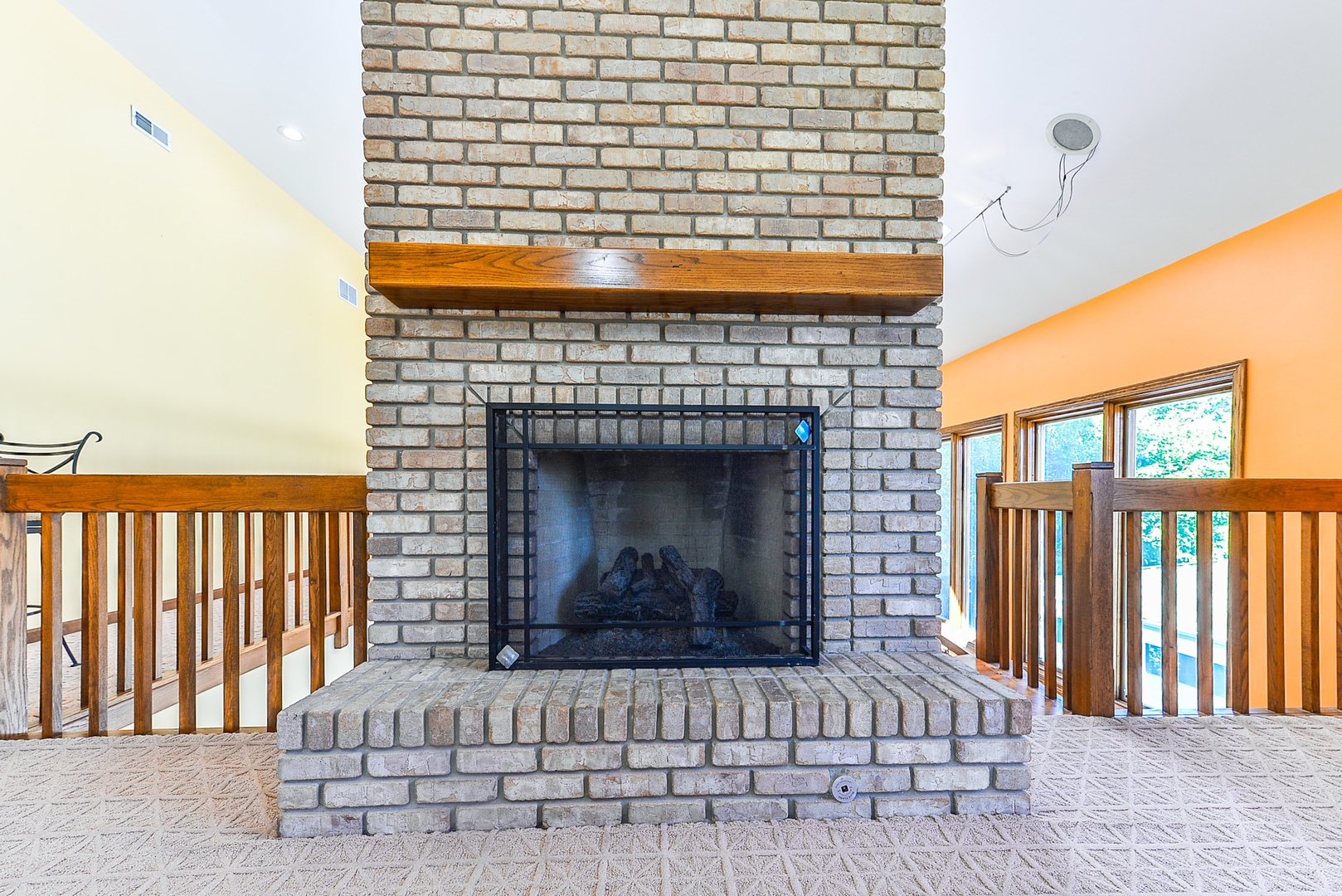 624 Riedy Road Lisle, IL 60532 - Photo 23 of 68 a living room with a fireplace furniture and a window