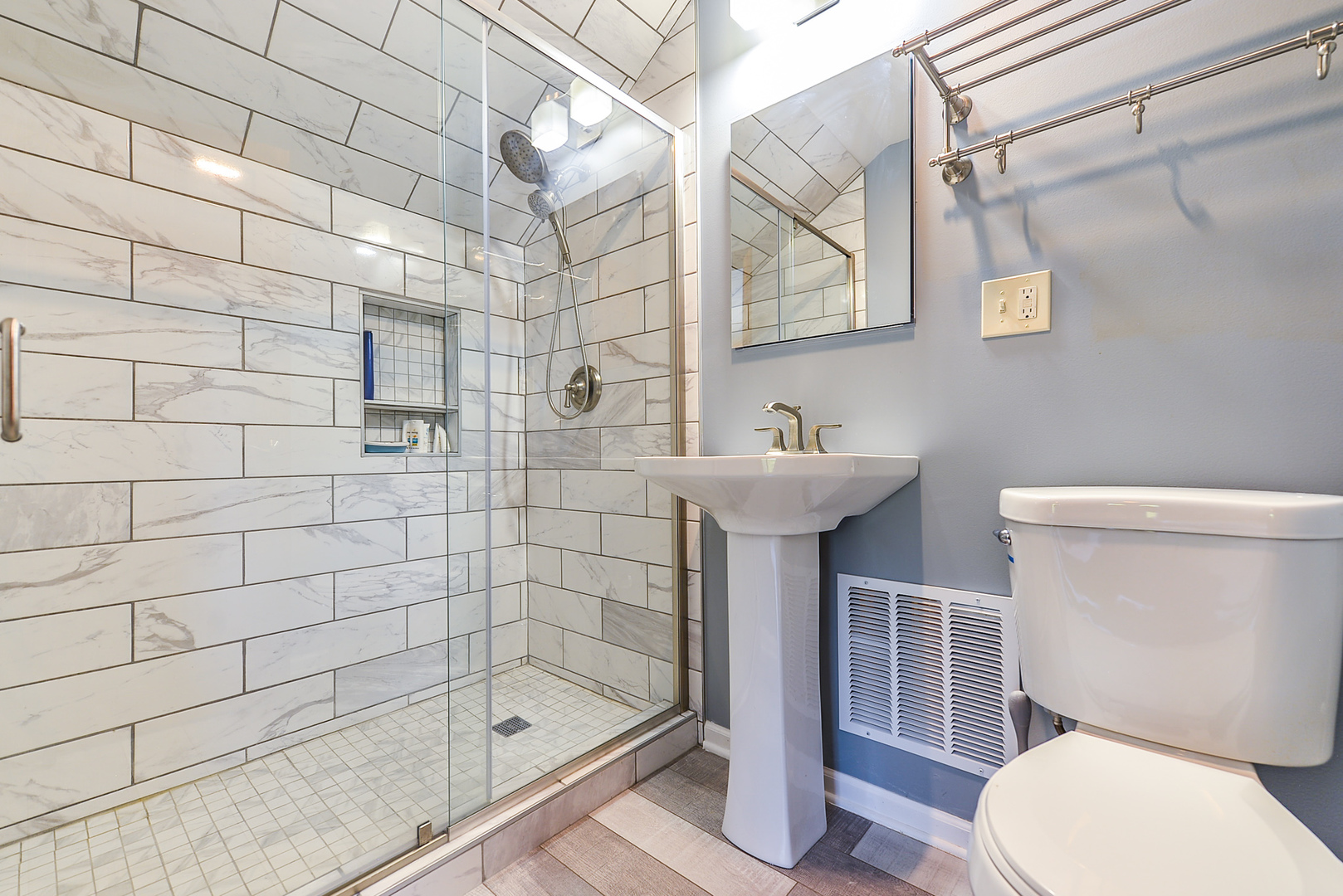 624 Riedy Road Lisle, IL 60532 - Photo 36 of 68 a bathroom with a sink a toilet and shower