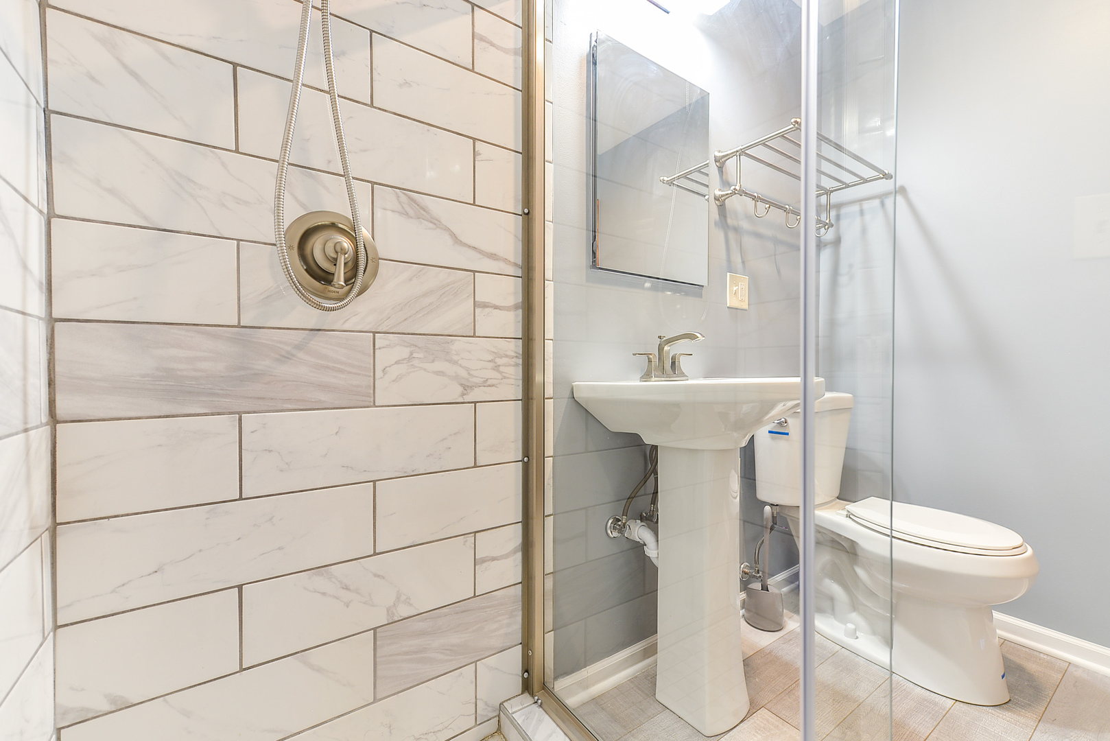 624 Riedy Road Lisle, IL 60532 - Photo 37 of 68 a bathroom with a sink toilet and shower