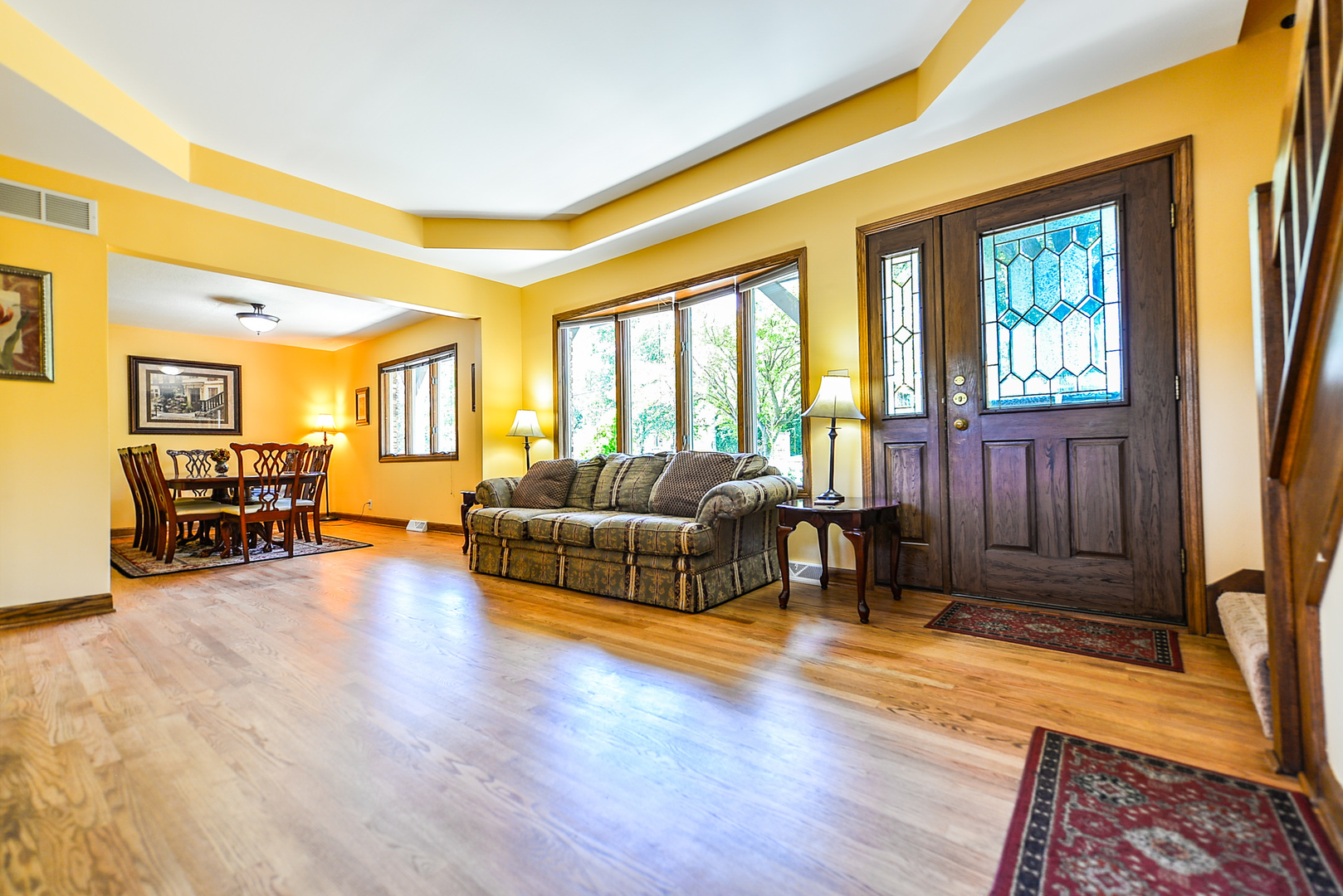 624 Riedy Road Lisle, IL 60532 - Photo 4 of 68 a living room with furniture and a wooden floor