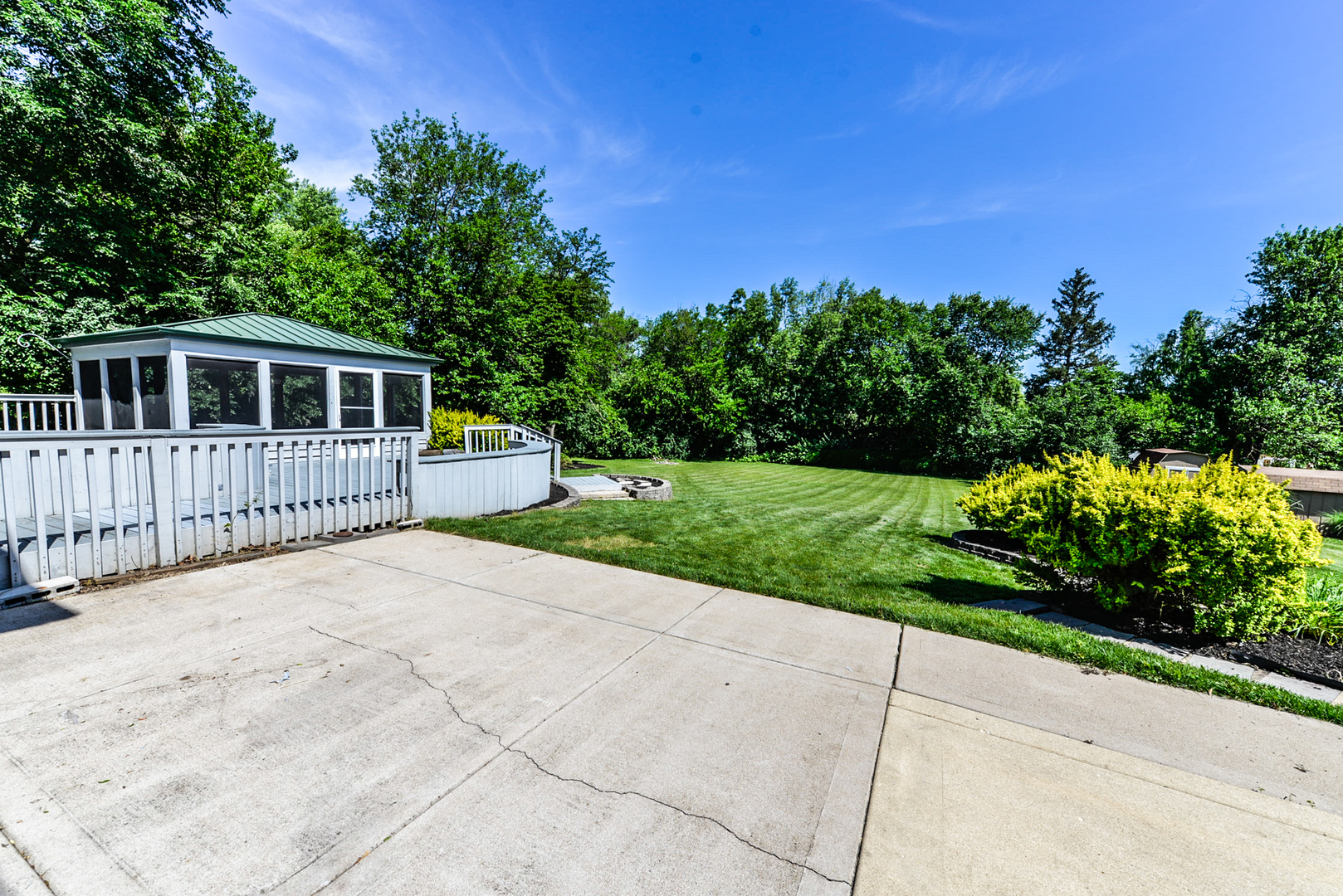 624 Riedy Road Lisle, IL 60532 - Photo 61 of 68 a front view of a house with a yard and potted plants