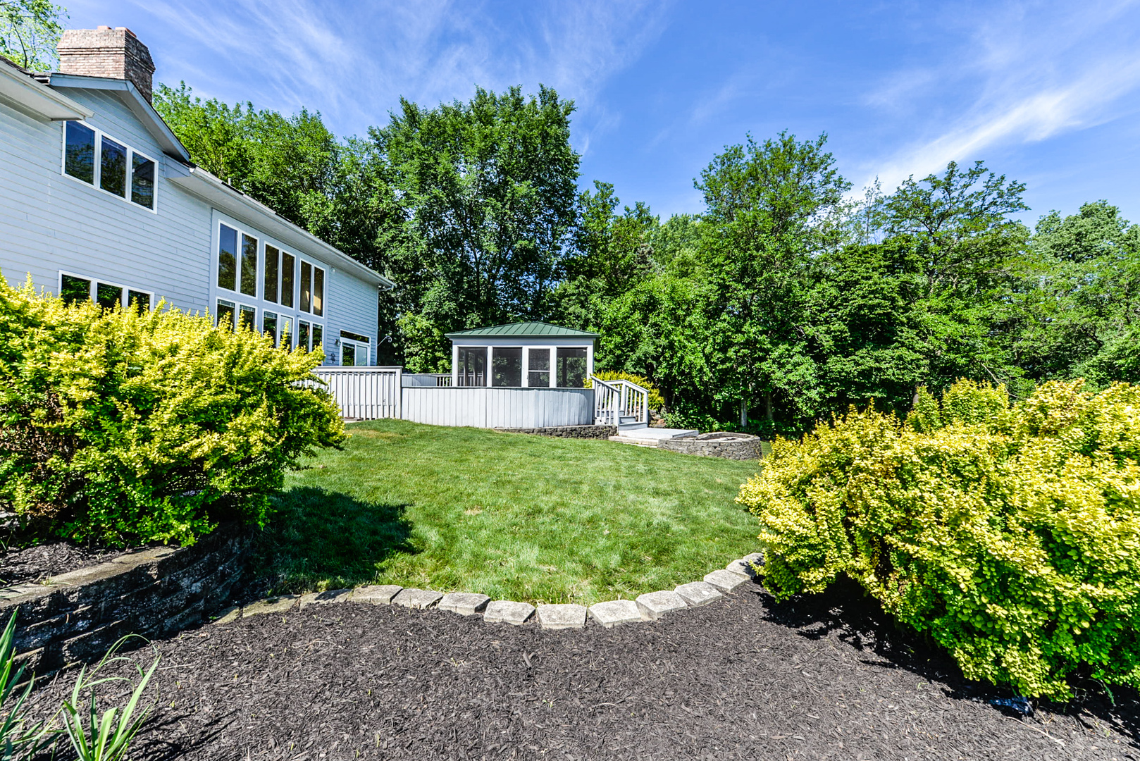624 Riedy Road Lisle, IL 60532 - Photo 63 of 68 a front view of a house with a yard