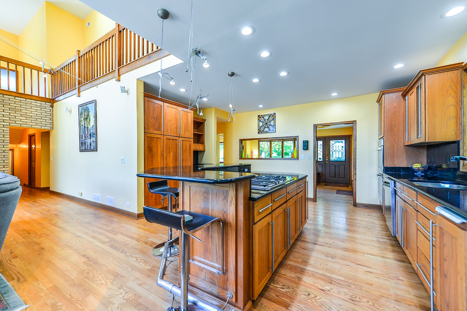 624 Riedy Road Lisle, IL 60532 - Photo 7 of 68 a kitchen with stainless steel appliances granite countertop a sink and a stove