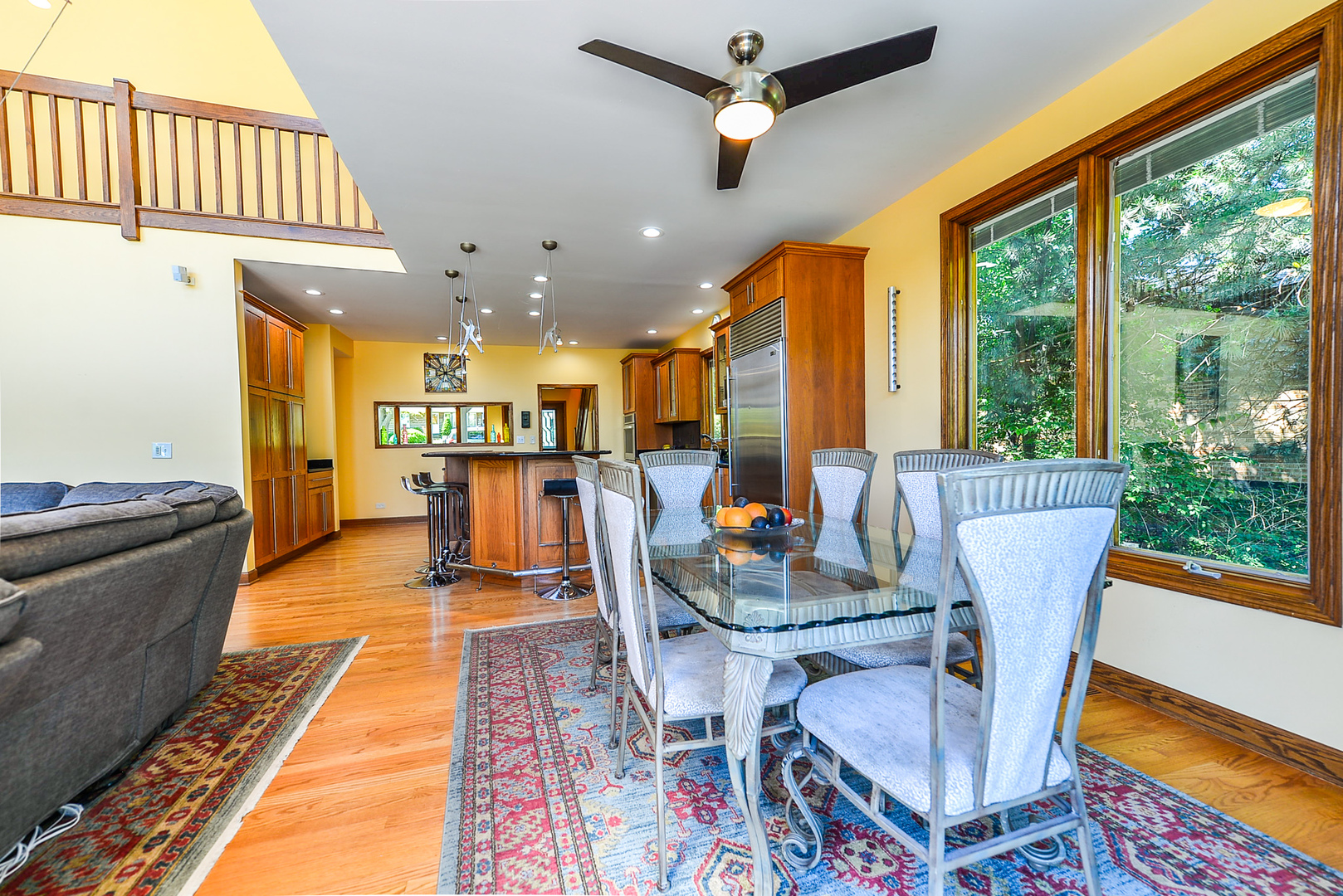 624 Riedy Road Lisle, IL 60532 - Photo 10 of 68 a dining room with furniture and a floor to ceiling window