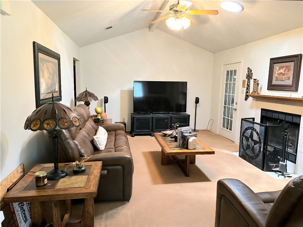 219 Ripple Creek Lane Somerville, TX 77879 - Photo 21 of 46 a living room with furniture and a flat screen tv
