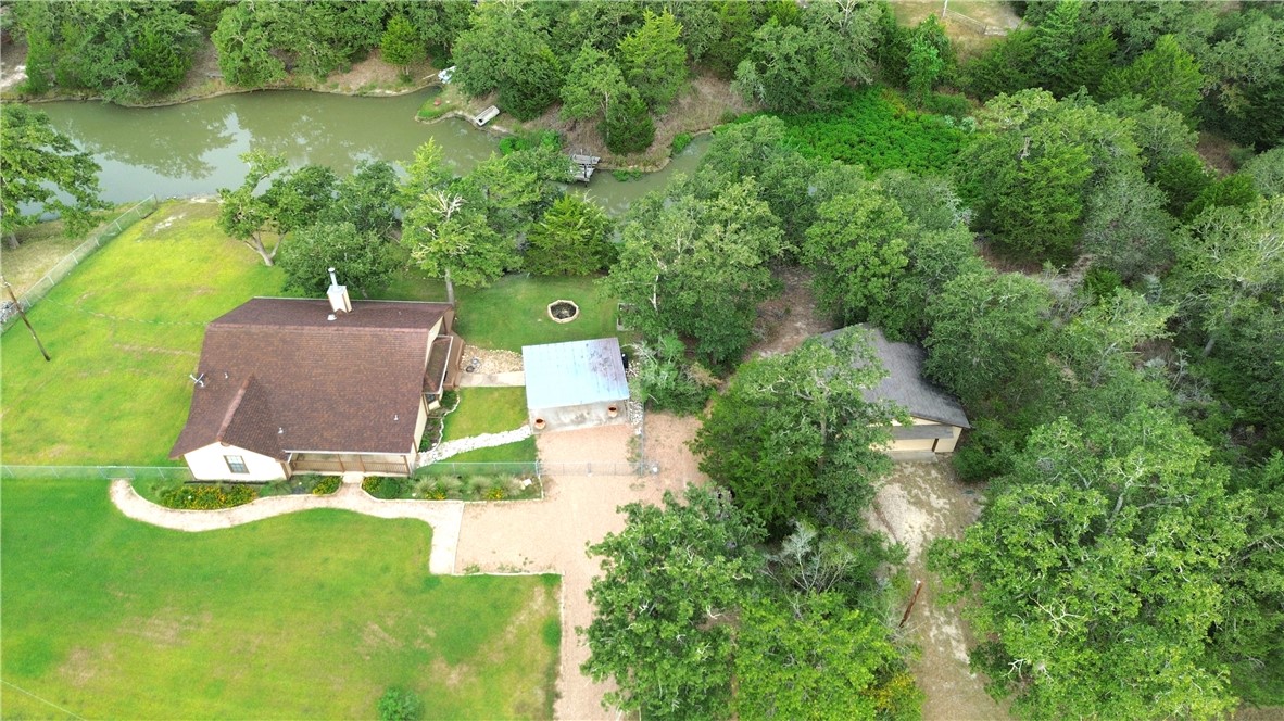 219 Ripple Creek Lane Somerville, TX 77879 - Photo 40 of 46 an aerial view of a house with a yard basket ball court and outdoor seating
