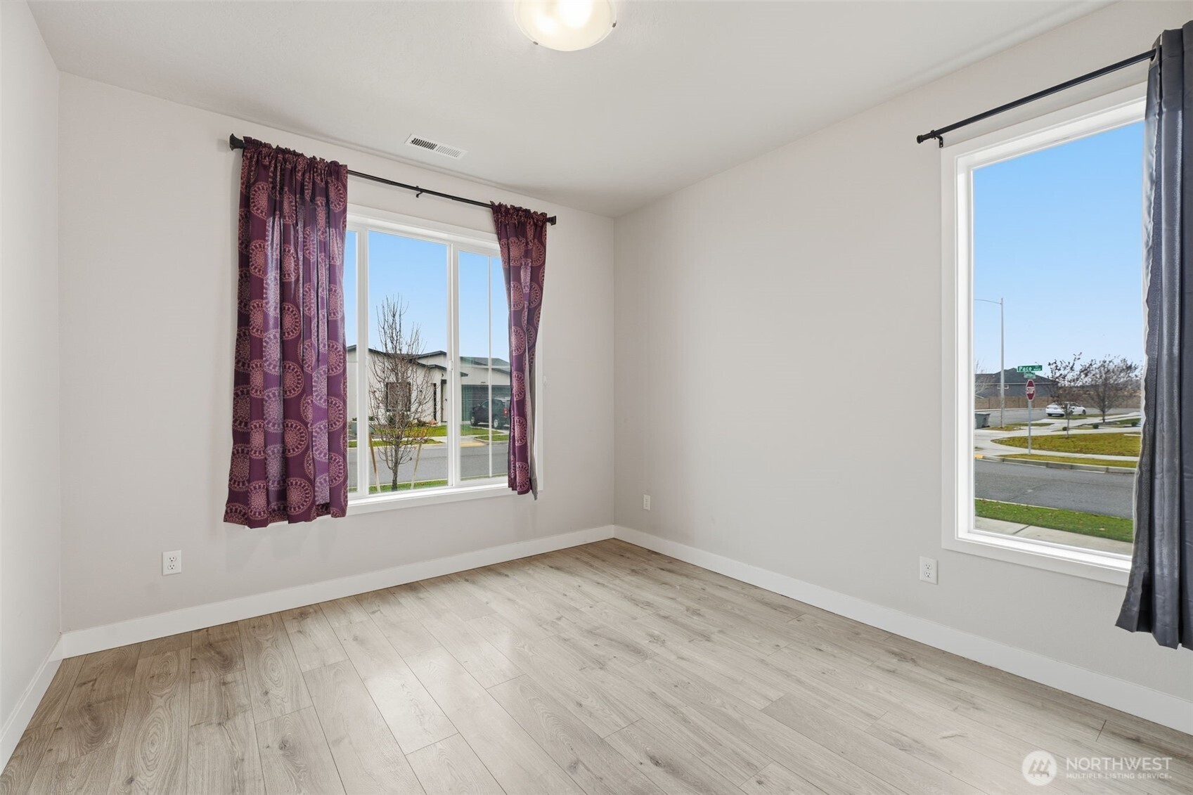 2572 Clark Ridge Drive Richland, WA 99352 - Photo 20 of 25 a view of a room with wooden floor and windows