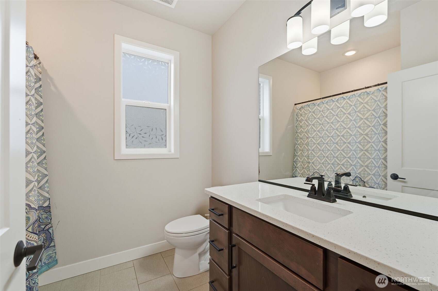 2572 Clark Ridge Drive Richland, WA 99352 - Photo 21 of 25 a bathroom with a sink a toilet and a mirror