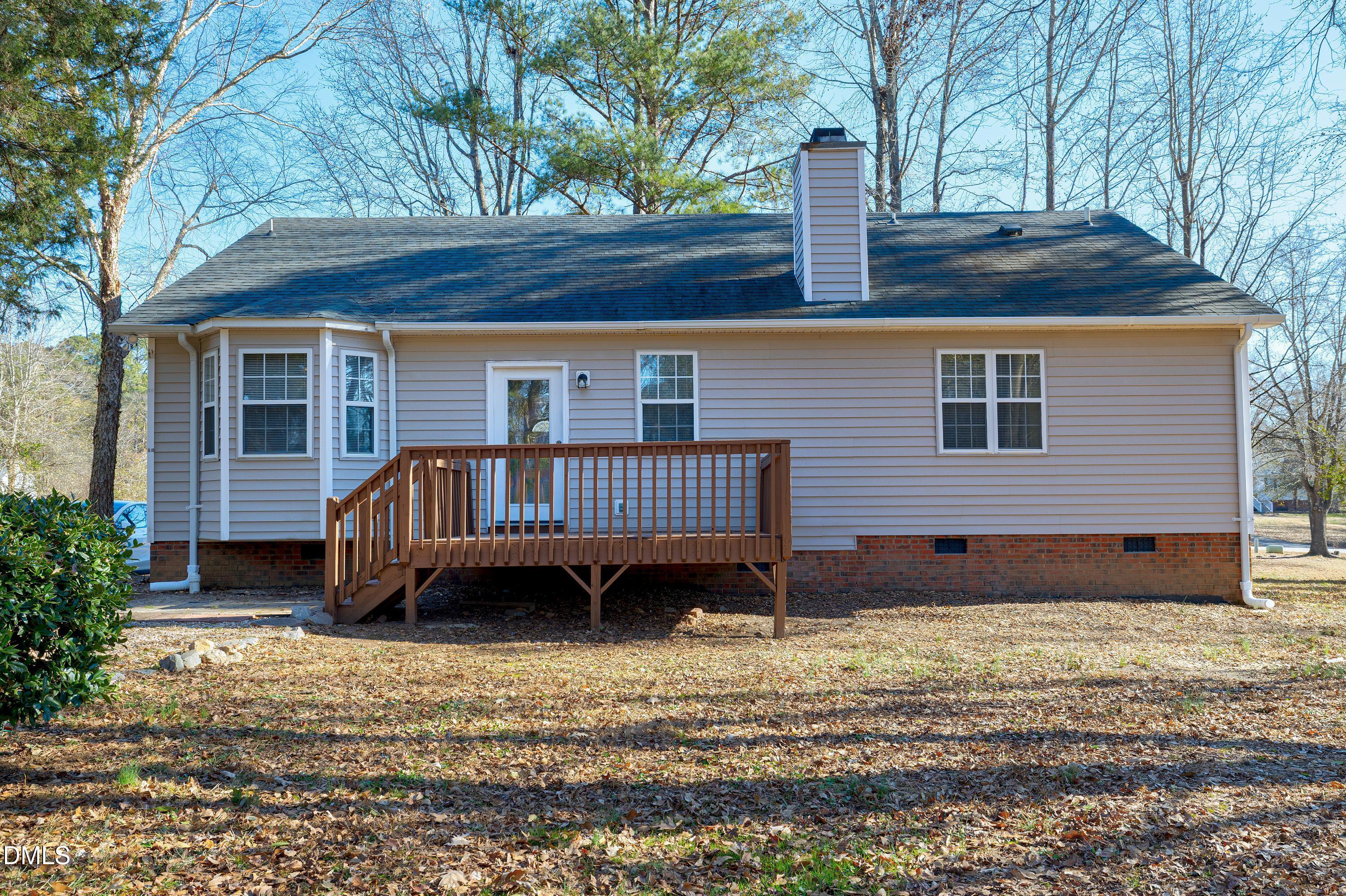 4100 Rockside Hills Drive Raleigh, NC 27603 - Photo 42 of 52 a view of a house with a roof deck