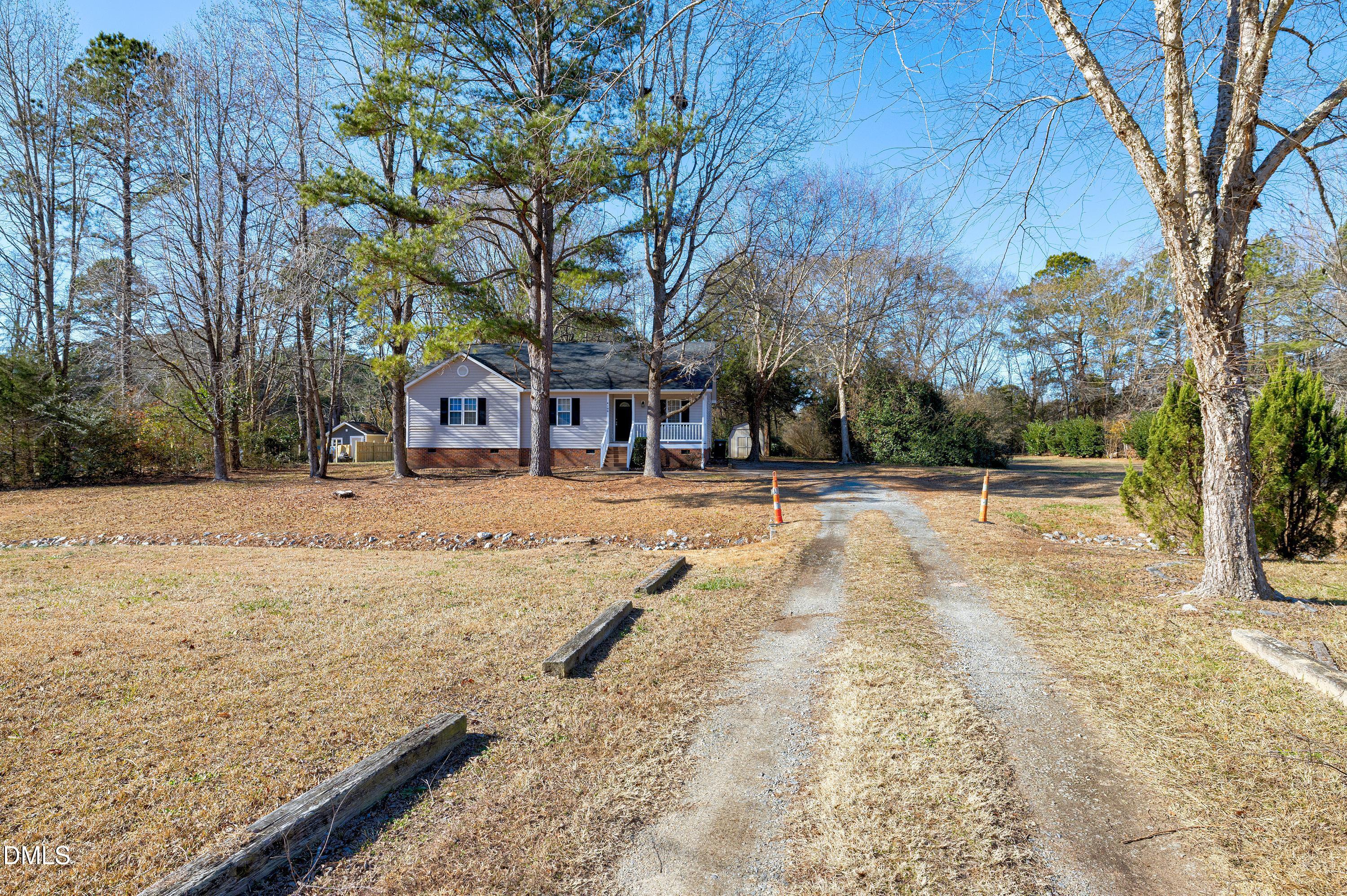 4100 Rockside Hills Drive Raleigh, NC 27603 - Photo 44 of 52 a view of road with trees