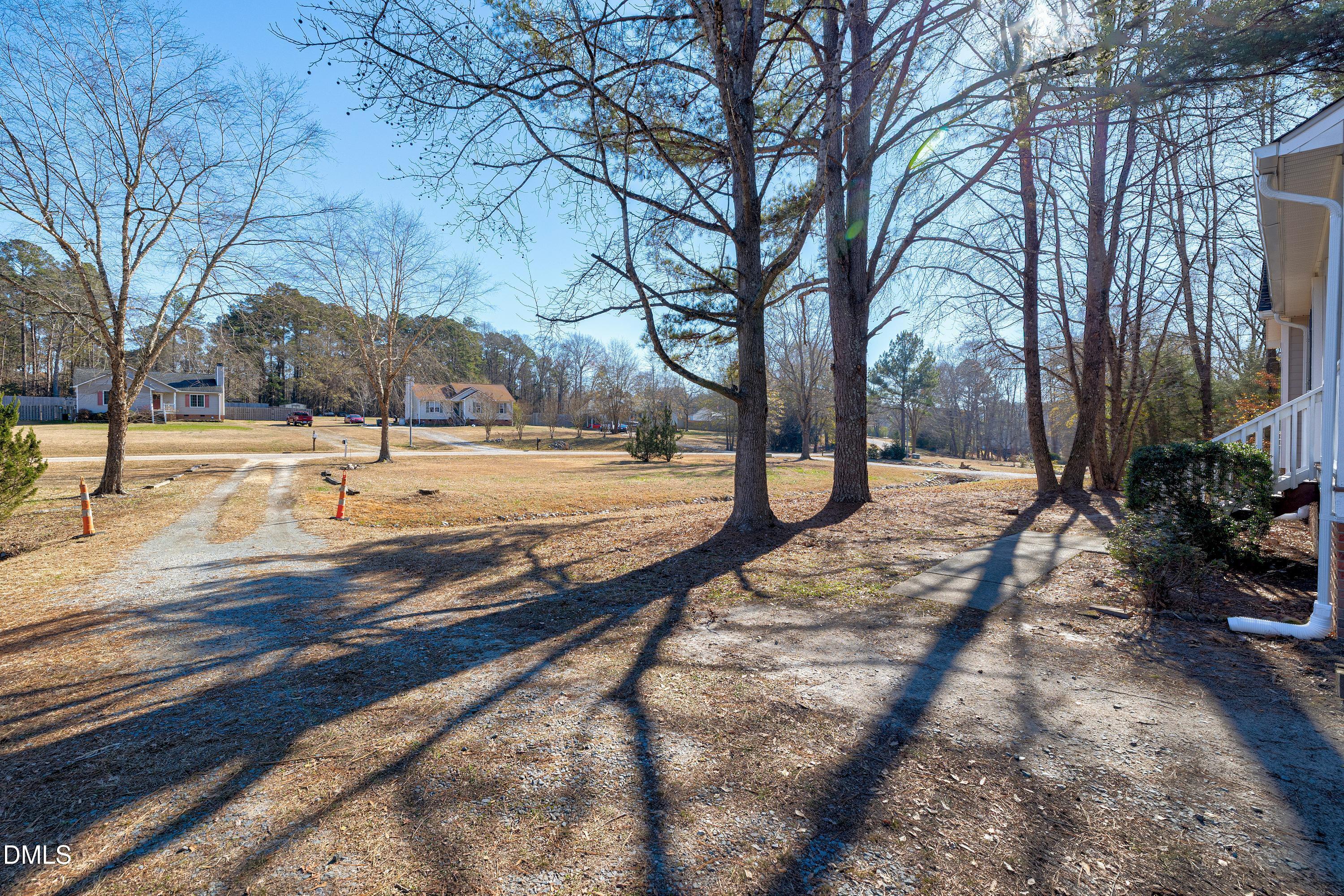 4100 Rockside Hills Drive Raleigh, NC 27603 - Photo 48 of 52 a view of road with trees