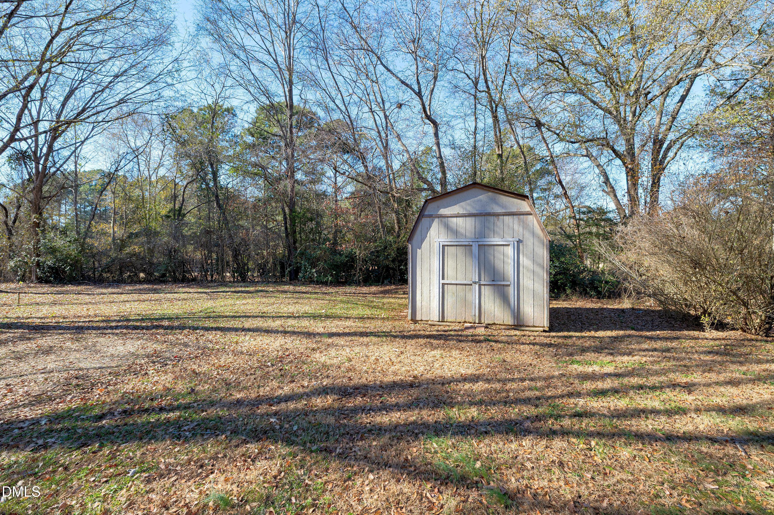 4100 Rockside Hills Drive Raleigh, NC 27603 - Photo 51 of 52 a front view of a house with a yard