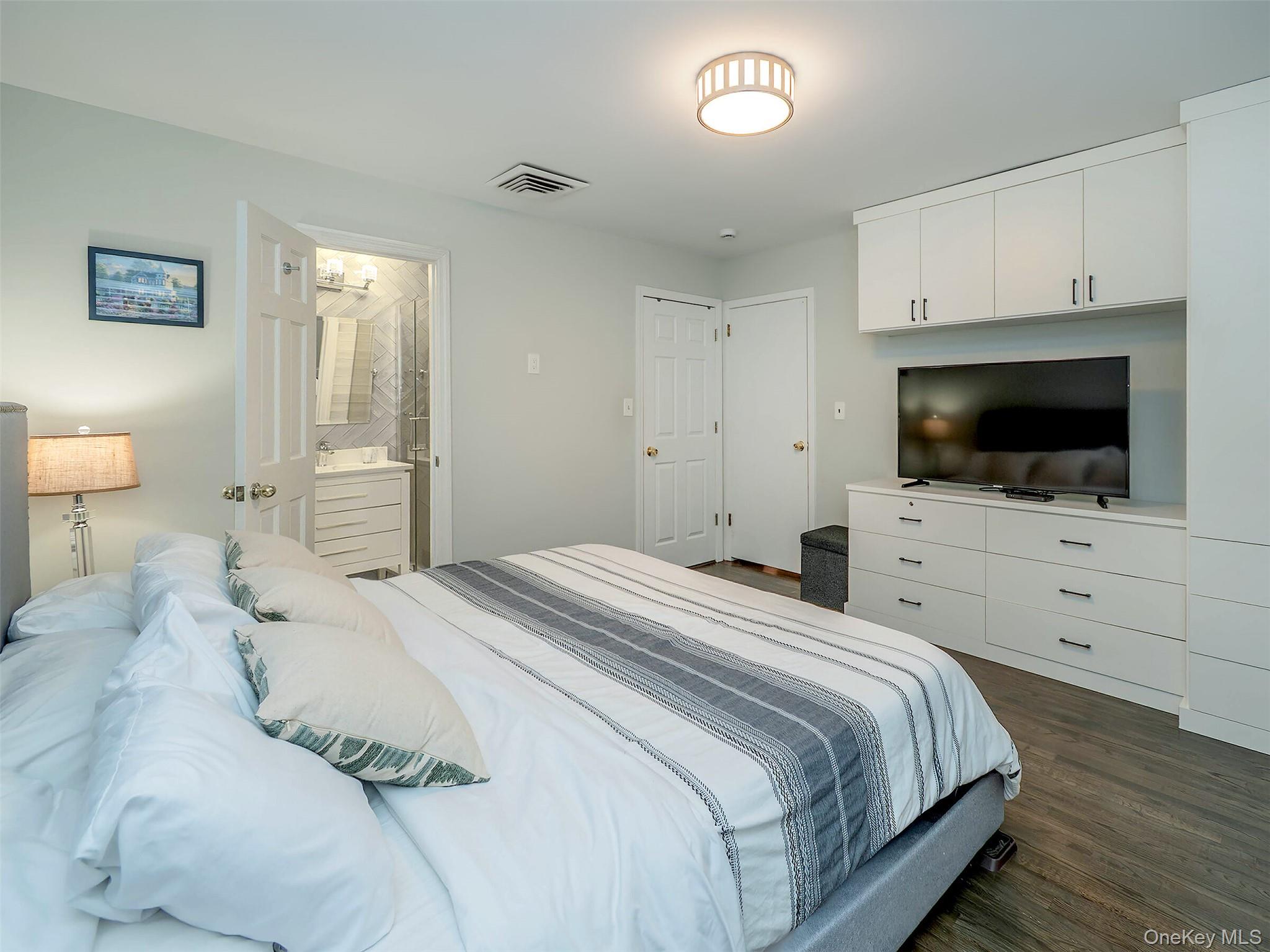 16 Underhill Road Glen Head, NY 11545 - Photo 19 of 30 Main Fl.: Primary has built-in dresser/closet. En-suite, bathroom.