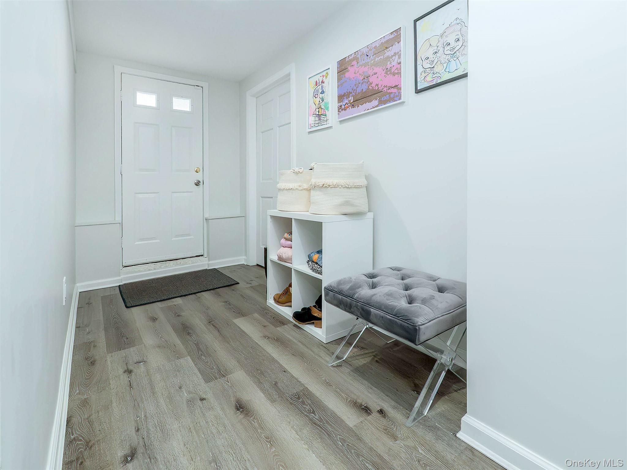 16 Underhill Road Glen Head, NY 11545 - Photo 29 of 30 Lower Level: Door opens to the backyard.