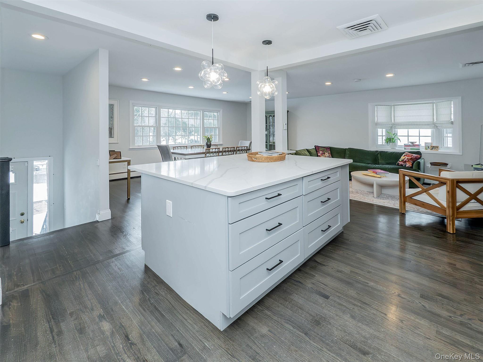 16 Underhill Road Glen Head, NY 11545 - Photo 6 of 30 Oversized island with Quartz countertops. Lots of storage.