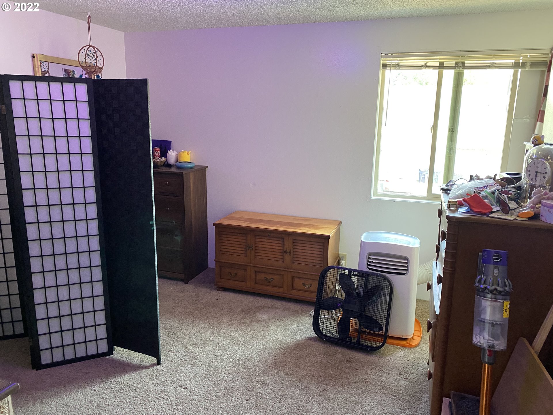 85 V Street Springfield, OR 97477 - Photo 21 of 25 a room with furniture and a flat screen tv