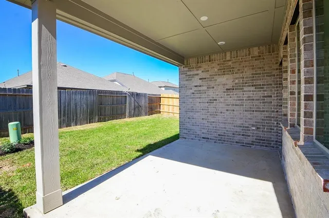 a view of a backyard with a garden