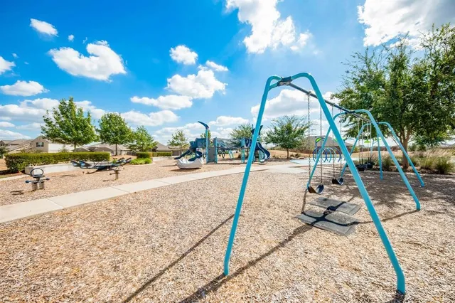 a view of swimming pool with outdoor seating