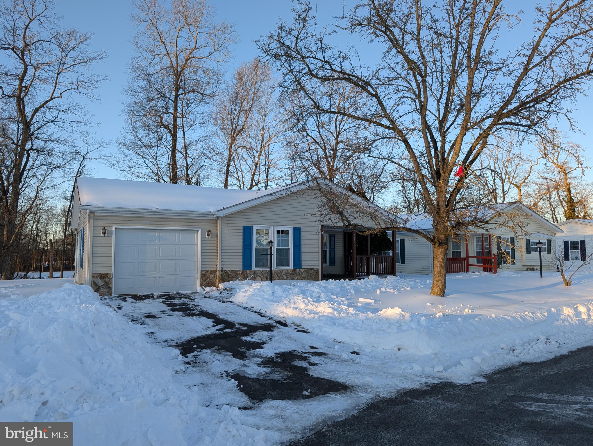 161 Grouse Circle New Hope, PA 18938 - Photo 1 of 16 a front view of a house with a yard covered in snow