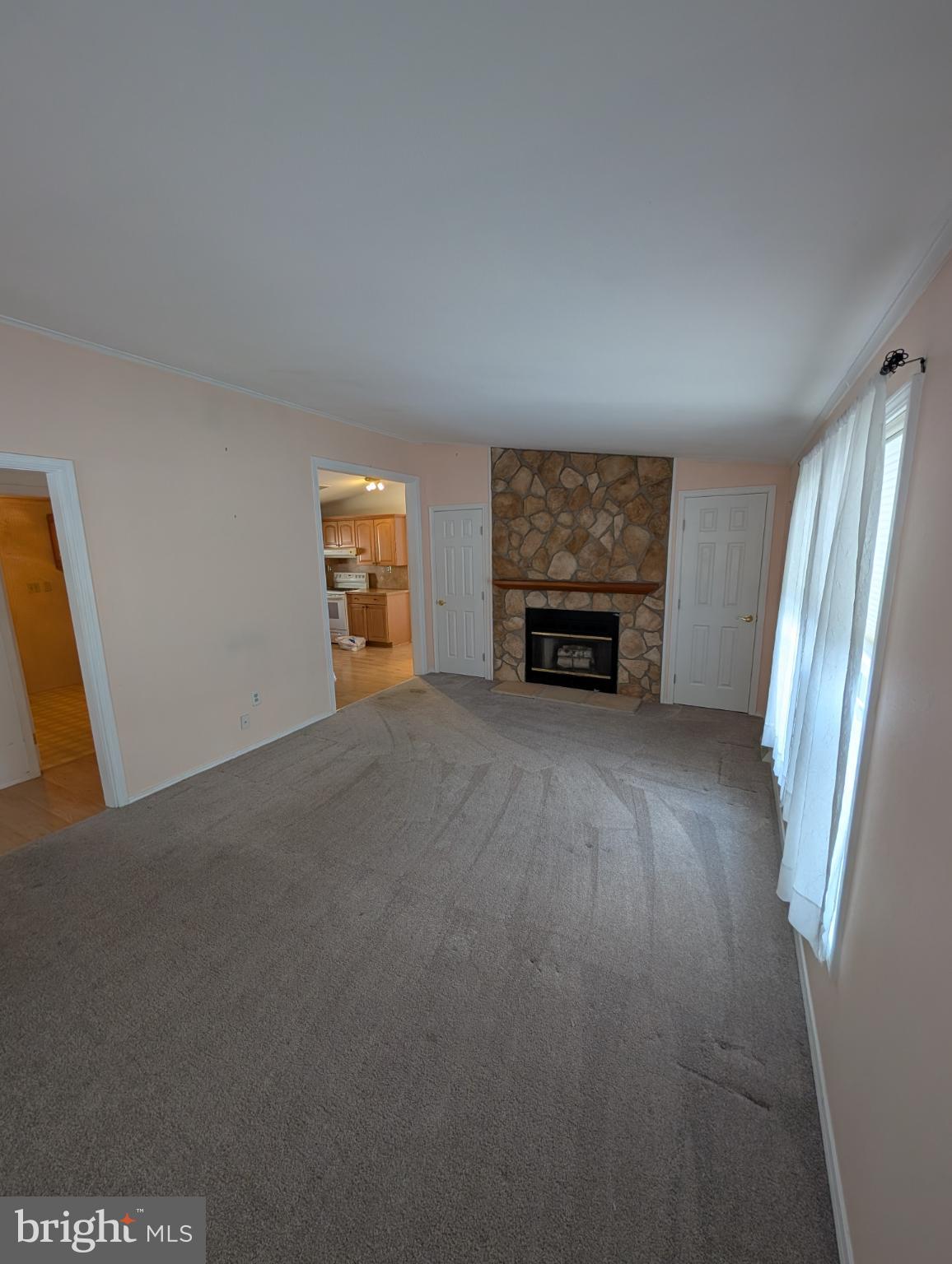 161 Grouse Circle New Hope, PA 18938 - Photo 2 of 16 a view of an empty room with a fireplace