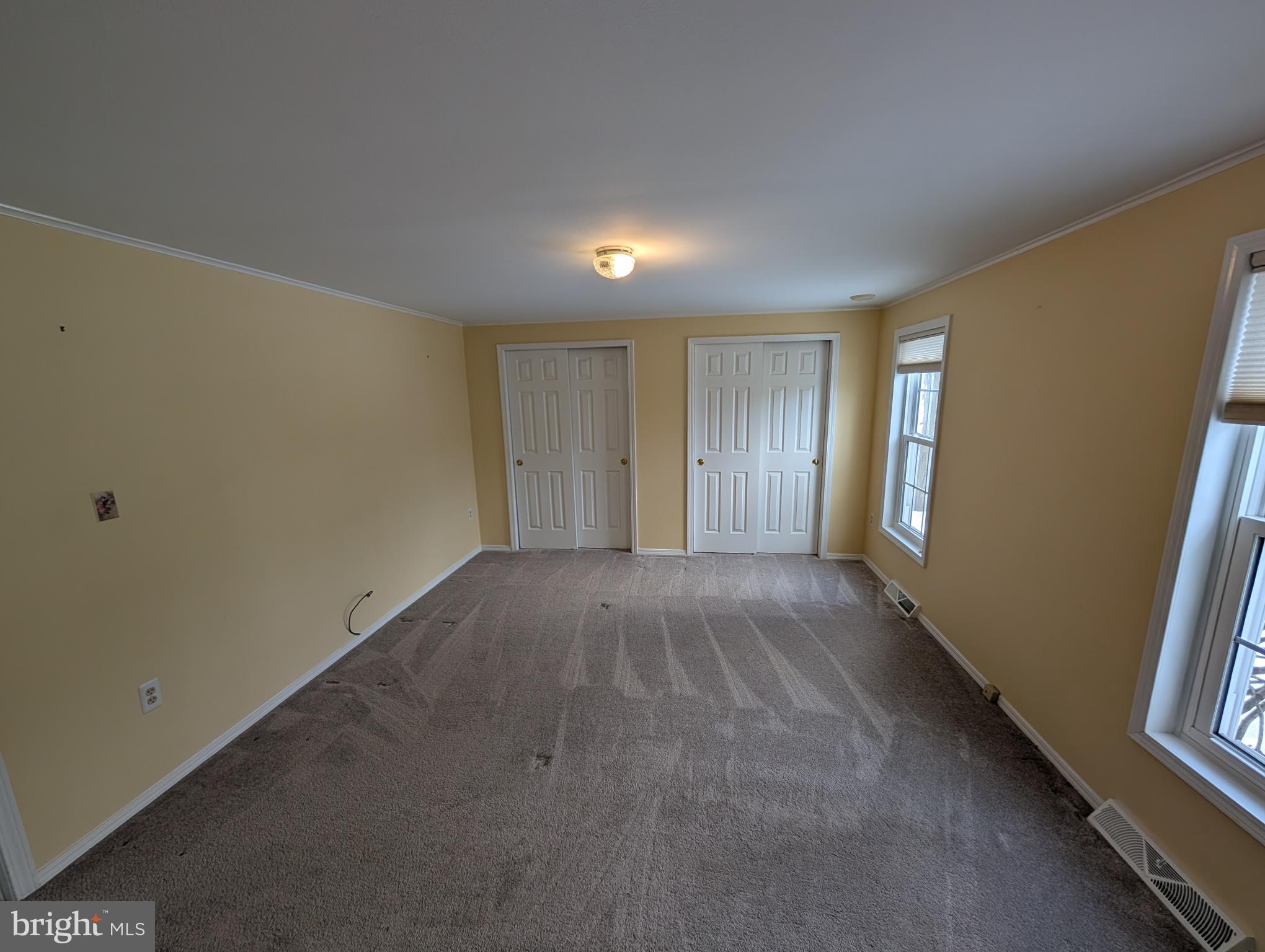 161 Grouse Circle New Hope, PA 18938 - Photo 8 of 16 a view of an empty room and window