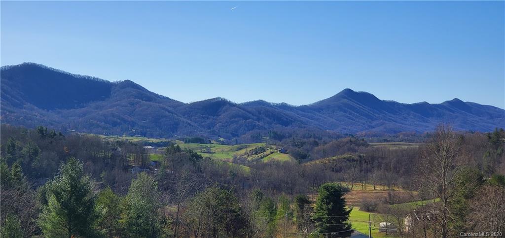 0 Jones Road Leicester, NC 28748 - Photo 1 of 15 a view of a house and a mountain view