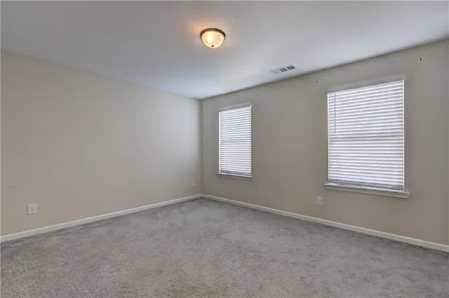 a view of storage and utility room with empty racks