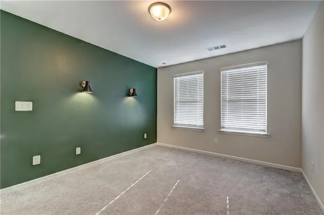 a view of a storage & utility room with a window