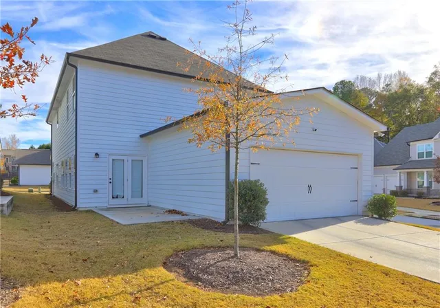 a view of swimming pool with an outdoor seating