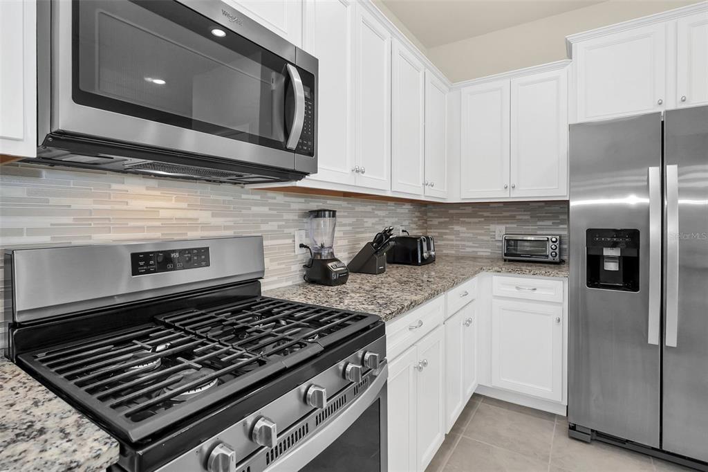 7487 Oakmoss Loop Davenport, FL 33837 - Photo 11 of 65