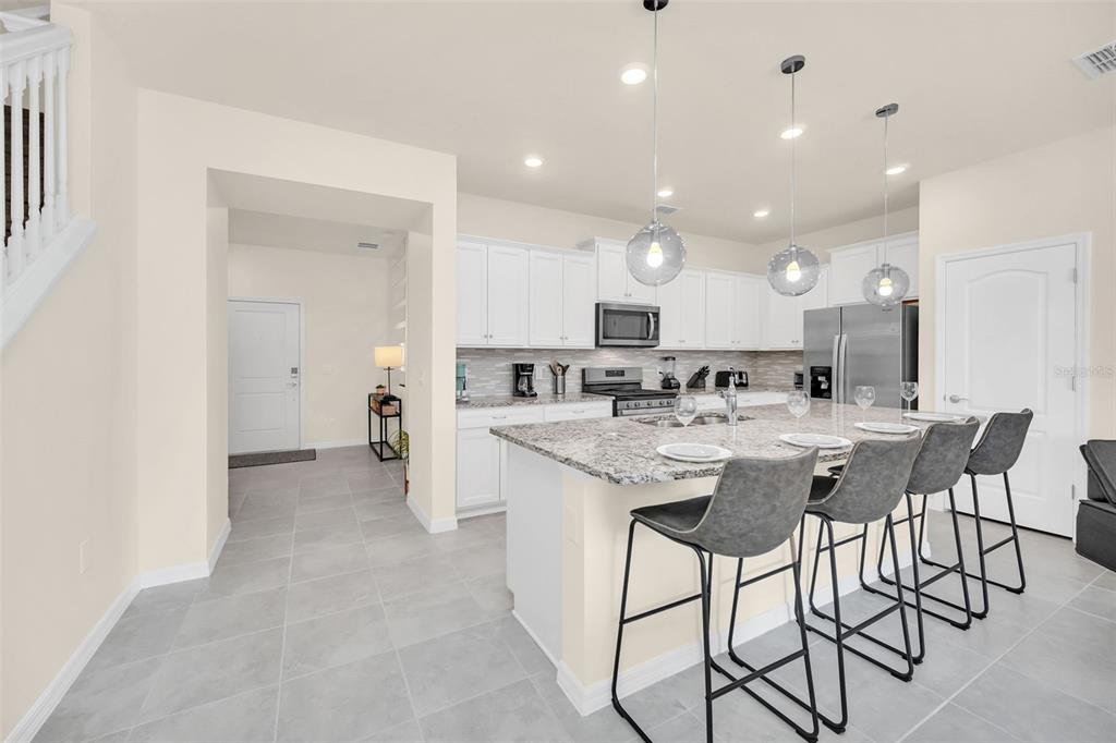 7487 Oakmoss Loop Davenport, FL 33837 - Photo 7 of 65